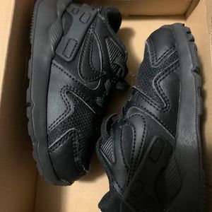 Little kids black Nike sneakers